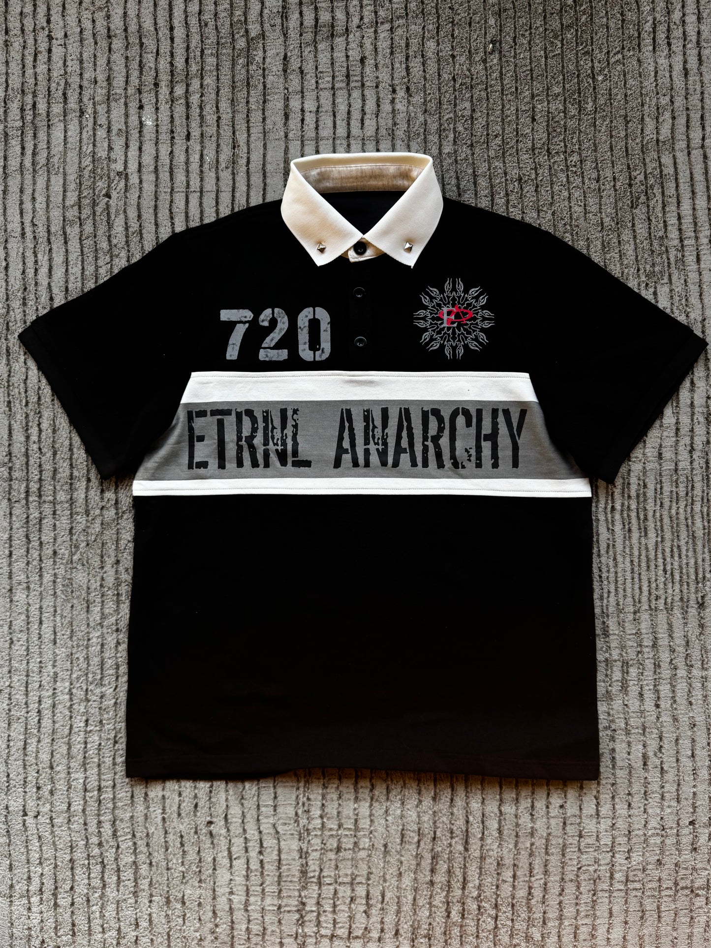 "REBELLION" POLO