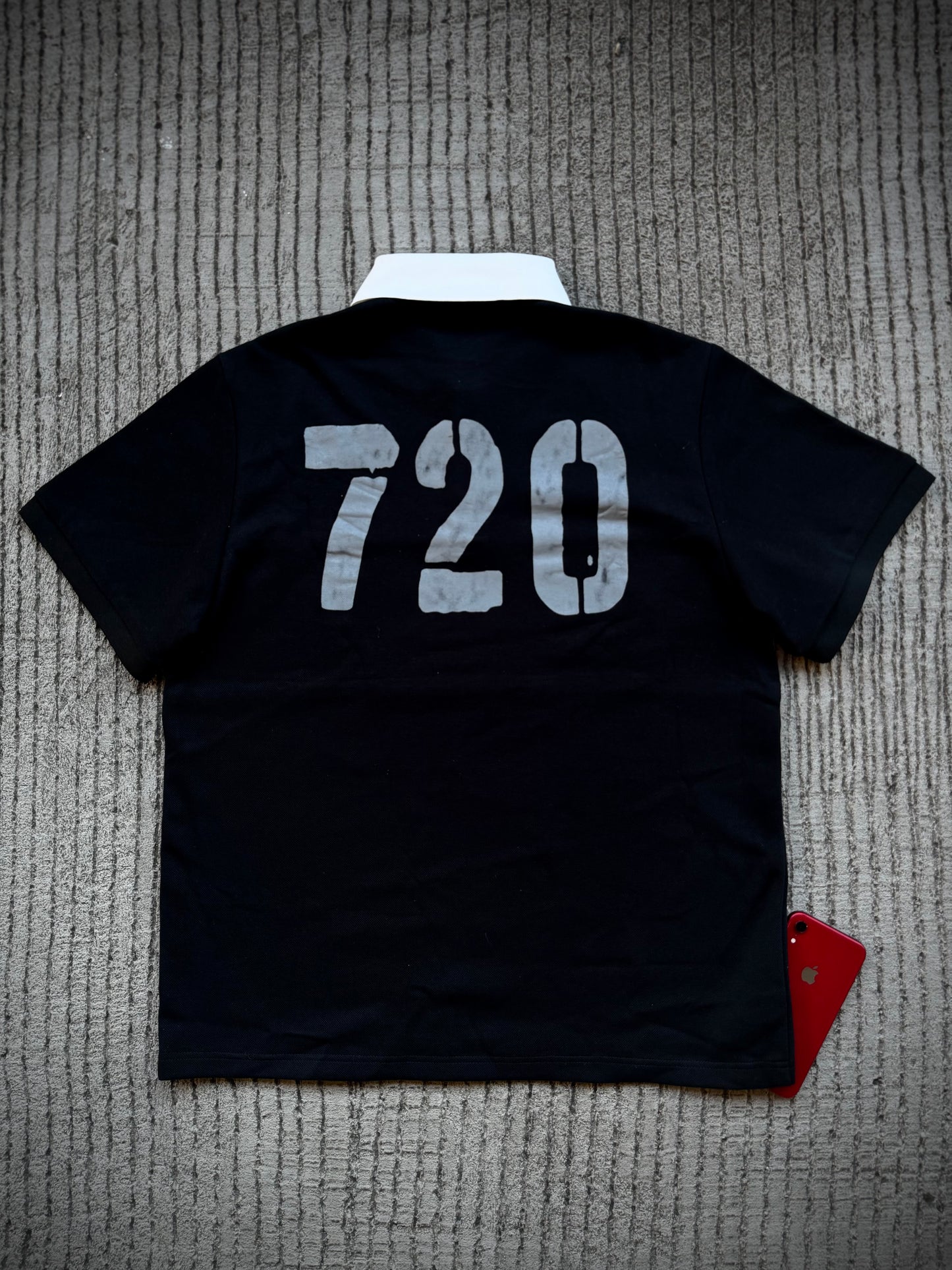 "REBELLION" POLO